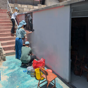 Photo of children painting wall